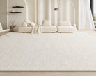Amelia Rug in a modern beige living room with a large cream sectional sofa and soft natural lighting