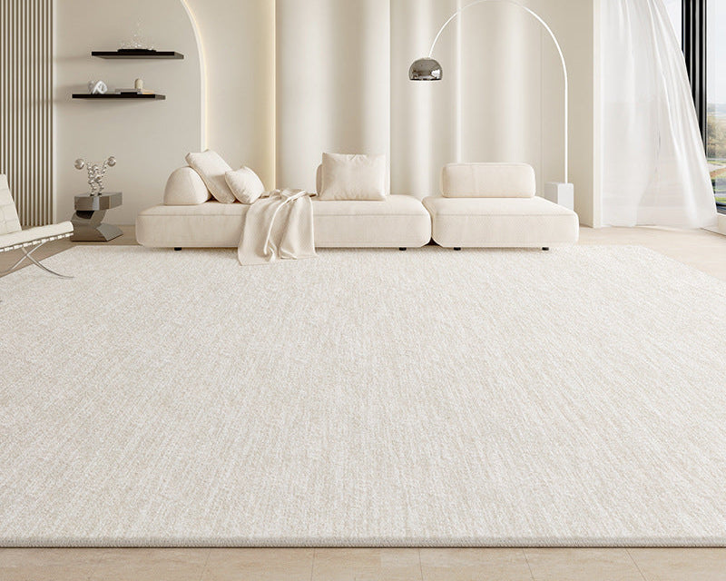 Amelia Rug in a modern beige living room with a large cream sectional sofa and soft natural lighting