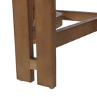 Close-up of a wooden chair frame on a white background