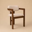 Angle view of the Amica Linen Ash Wood Dining Chair on a beige studio background