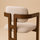 Back Close-up of the Amica Linen Ash Wood Dining Chair on a beige studio background