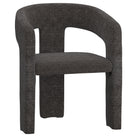 Angled view of the dark grey Archway dining chair showing its continuous curved armrest silhouette and textured charcoal fabric
