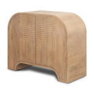 Angled view of Arco 2-door cabinet highlighting the seamless rounded waterfall edges and fluted texture.
