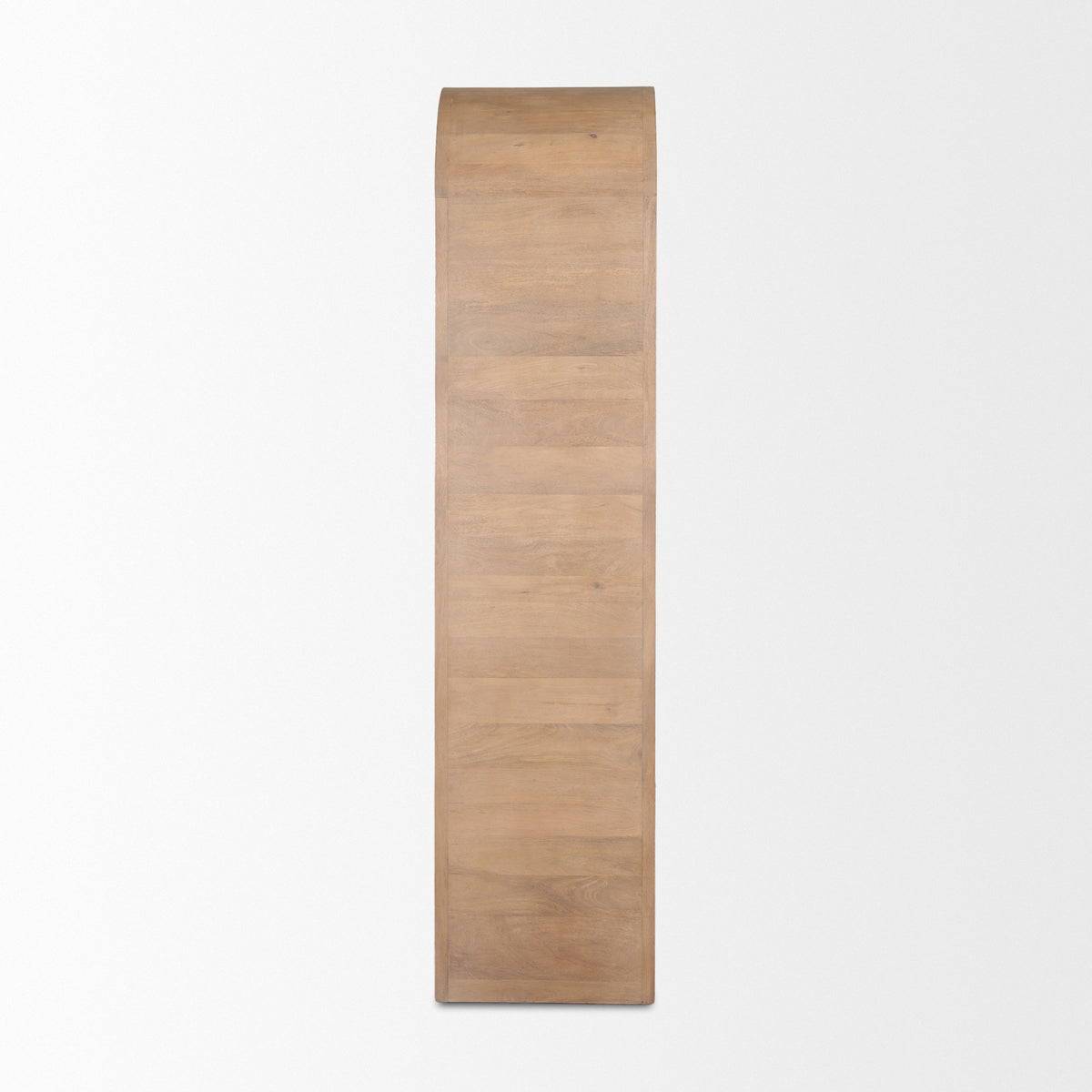 Side profile view of the Arco curio cabinet showing the smooth mango wood grain and waterfall curve