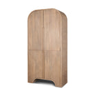 Angled view of tall Arco curio cabinet highlighting the seamless rounded waterfall edges and fluted texture.