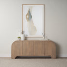 Arco fluted sideboard styled in a modern neutral living room beneath abstract wall art.
