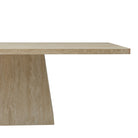 Side detail of the Ardella Dining Table in natural travertine