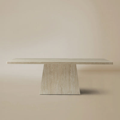Front view of the Ardella travertine-look sintered stone dining table