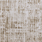 Textured beige and brown patterned rug closeup.