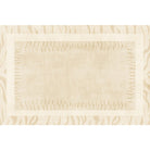 Artisan Stitched Ivory Rug with soft beige tones and subtle stitched border design