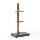 Arvessa display easel with brass-plated iron frame and dark marble base, angled view