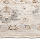 Close-up of the Aurelia Vintage Floral Rug in Ivory showing its soft-touch floral pile in cream, taupe and muted blue.