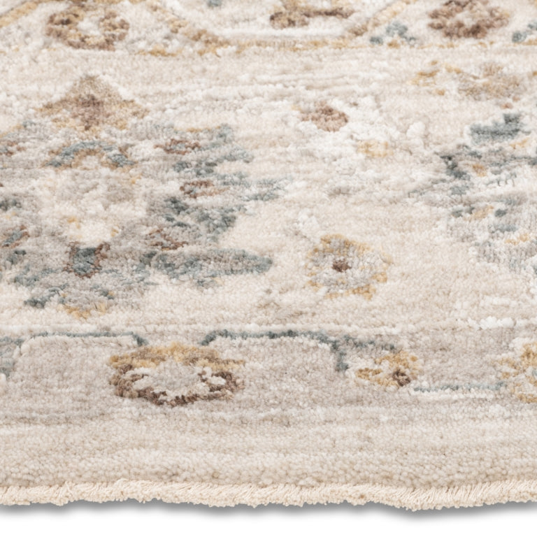 Close-up of the Aurelia Vintage Floral Rug in Ivory showing its soft-touch floral pile in cream, taupe and muted blue.