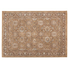 Full view of the Aurelia Vintage Floral Rug in Mocha with a warm brown field, ivory floral motifs and muted blue accents.