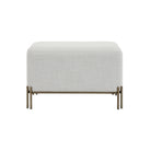Front view of the Aurelie Linen Accent Stool in white with painted brass iron legs.