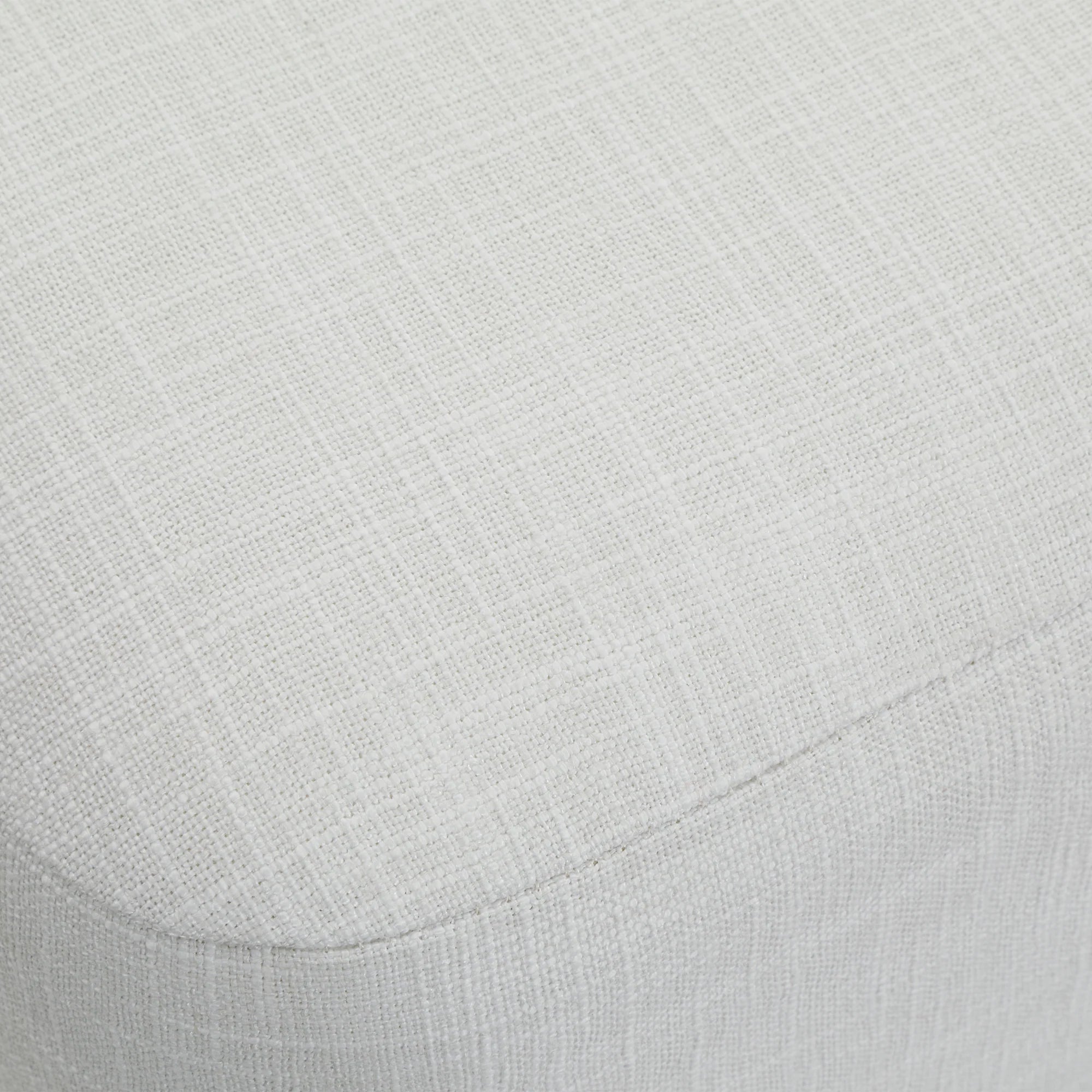 Close-up of the textured white linen upholstery on the Aurelie Linen Accent Stool.