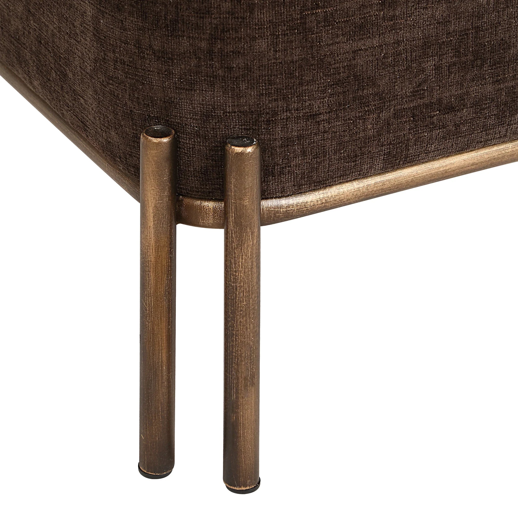 Close-up of the painted brass iron leg detail on the brown Aurelie Square Linen Accent Stool.