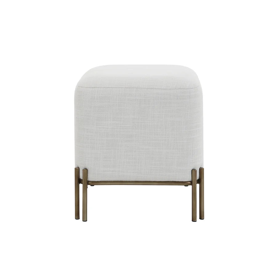 Front view of the Aurelie Square Linen Accent Stool in white with painted brass iron legs.