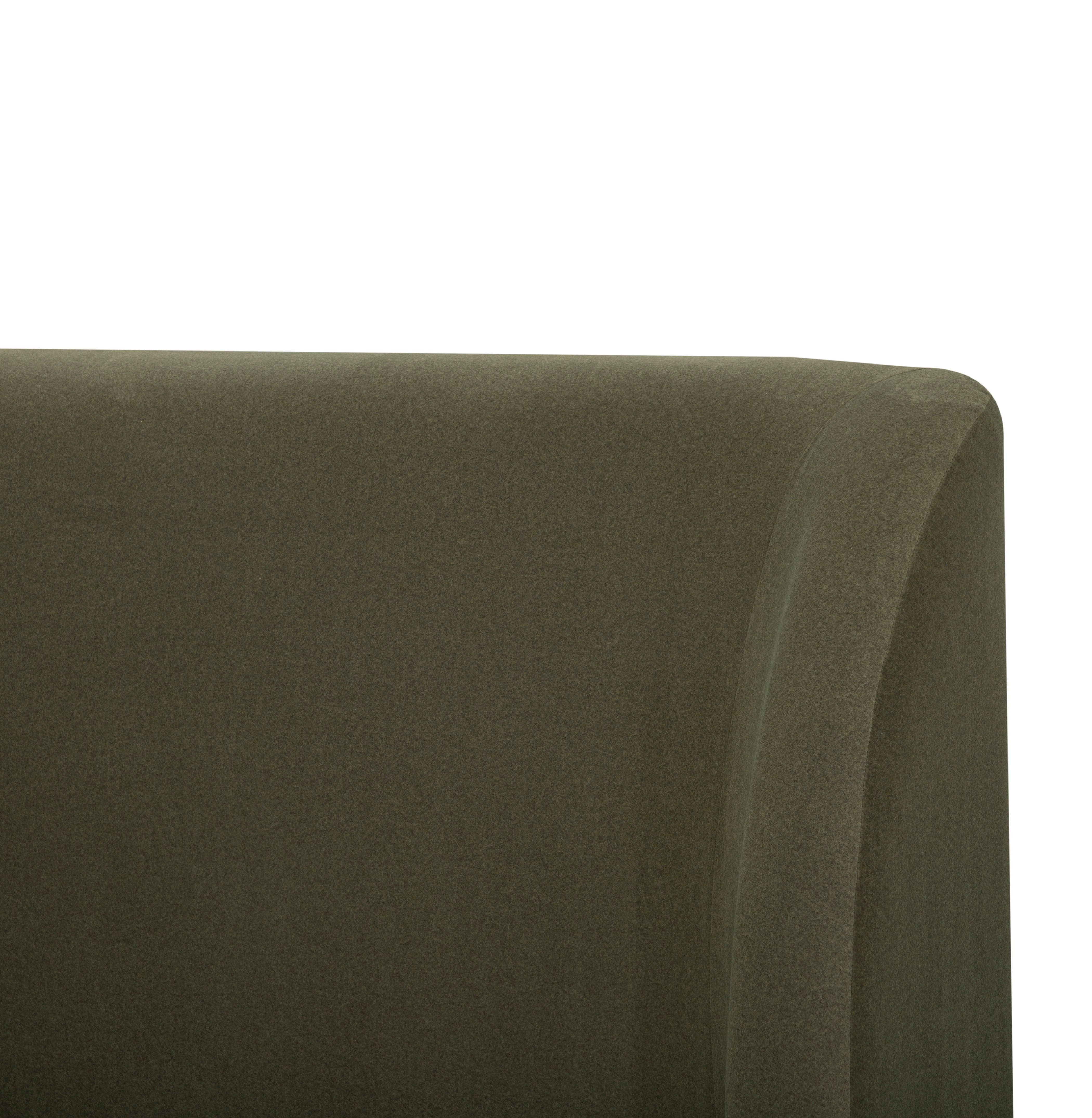 Close-up of a dark olive green upholstered Aveline Velvet Bed corner showing the fabric texture against a white background.