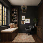 The Beatrice profile wall art styled as part of a gallery wall in a moody, dark-painted office setting.
