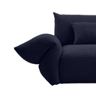 [Serenity Blue] Close-up front view of the Blooming Embrace Modular Sofa showing the curved adjustable armrest, seat and back cushions in Serenity Blue chenille on a white background