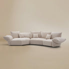 [Pearl White / Blooming Combo A (132"-140")] Angled view of the Blooming Embrace Modular Sofa, Combo A, in Pearl White chenille on a beige studio background