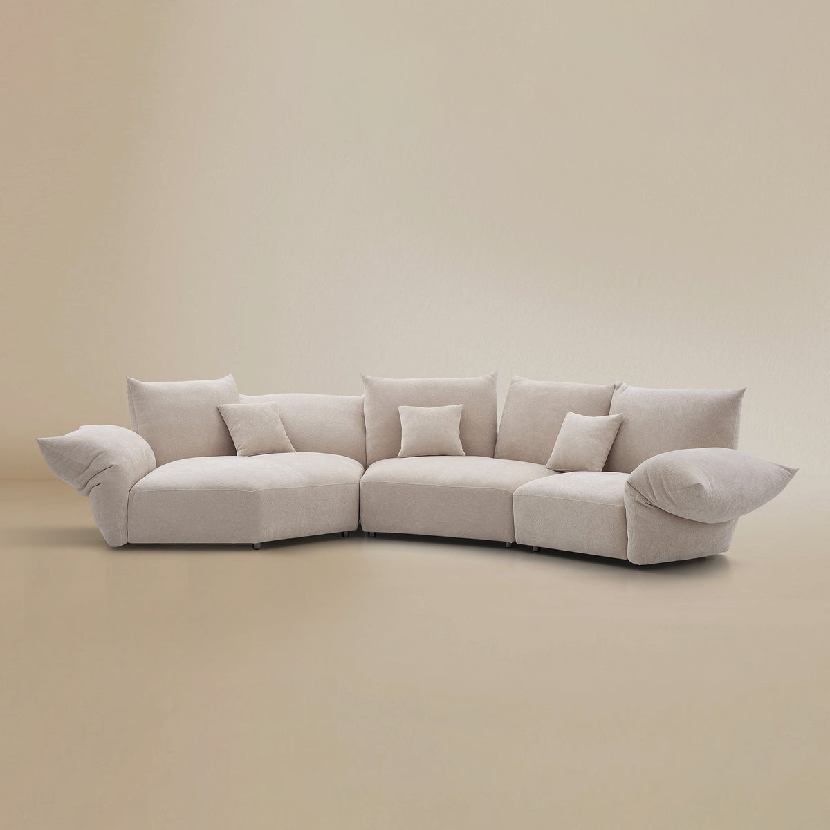 Angled view of the Blooming Embrace Modular Sofa, Combo A, in Pearl White chenille on a beige studio background