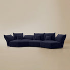 [Serenity Blue / Blooming Combo B (150"-169")] Angled view of the Blooming Embrace Modular Sofa, Combo B, in Serenity Blue chenille on a beige studio background