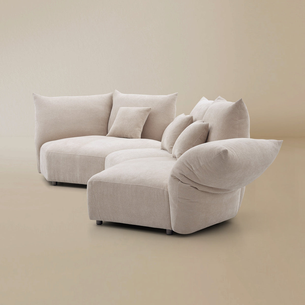 Side view of the Blooming Embrace Modular Sofa, Combo B, in Pearl White chenille on a beige studio background