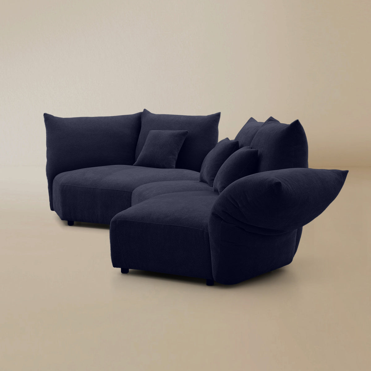 Side view of the Blooming Embrace Modular Sofa, Combo B, in Serenity Blue chenille on a beige studio background