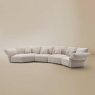 [Pearl White / Blooming Combo C (176"-196")] Angled view of the Blooming Embrace Modular Sofa, Combo C, in Pearl White chenille on a beige studio background