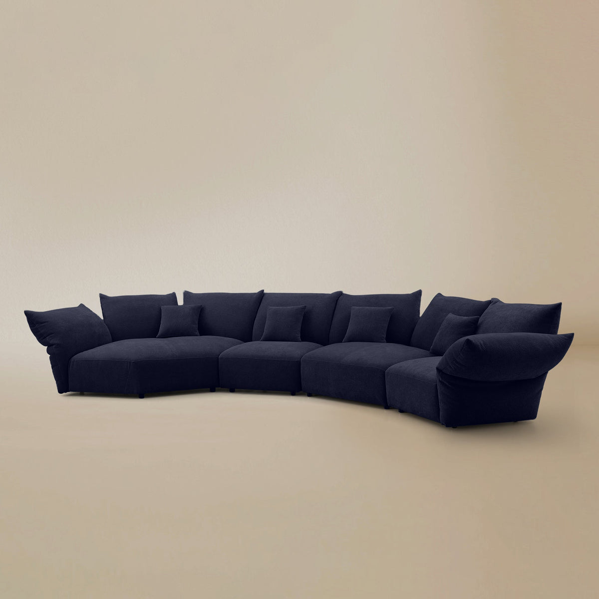 Angled view of the Blooming Embrace Modular Sofa, Combo C, in Serenity Blue chenille on a beige studio background