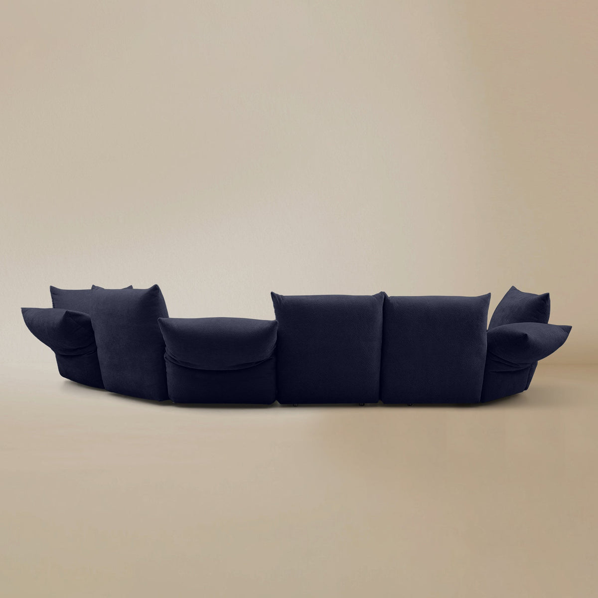 Back view of the Blooming Embrace Modular Sofa, Combo C, in Serenity Blue chenille on a beige studio background