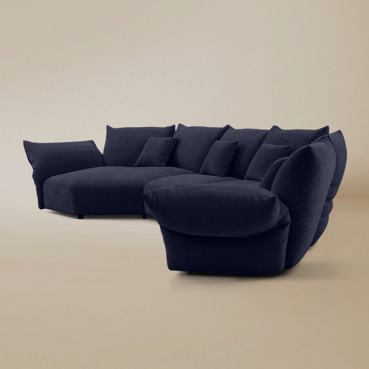 Side view of the Blooming Embrace Modular Sofa, Combo C, in Serenity Blue chenille on a beige studio background
