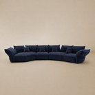 Blue sofa on a beige background.