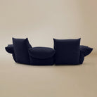 [Serenity Blue / Blooming Large Chaise with One Seater (104"-112")] Back view of the Blooming Embrace Modular Sofa, Large Chaise with One Seater, in Serenity Blue chenille on a beige studio background