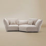 [Pearl White / Blooming Large Chaise with One Seater (104"-112")] Front view of the Blooming Embrace Modular Sofa, Large Chaise with One Seater, in Pearl White chenille on a beige studio background