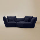 [Serenity Blue / Blooming Large Chaise with One Seater (104"-112")] Front view of the Blooming Embrace Modular Sofa, Large Chaise with One Seater, in Serenity Blue chenille on a beige studio background