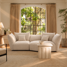 [Pearl White / Blooming Large Chaise with One Seater (104"-112")] Blooming Embrace Modular Sofa, Large Chaise with One Seater, in Pearl White chenille in a sunlit living room with an arched window, neutral curtains and a fluted stone coffee table