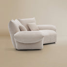 [Pearl White / Blooming Large Chaise with One Seater (104"-112")] Side view of the Blooming Embrace Modular Sofa, Large Chaise with One Seater, in Pearl White chenille on a beige studio background