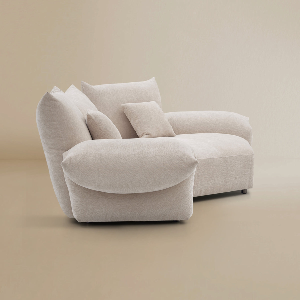 Side view of the Blooming Embrace Modular Sofa, Large Chaise with One Seater, in Pearl White chenille on a beige studio background