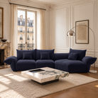 [Serenity Blue / Blooming Large Chaise with Two Seater (134"-152")] Blooming Embrace Modular Sofa, Large Chaise with Two Seater, in Serenity Blue chenille in a Parisian-style living room with tall windows, wall mouldings and a rectangular marble coffee table