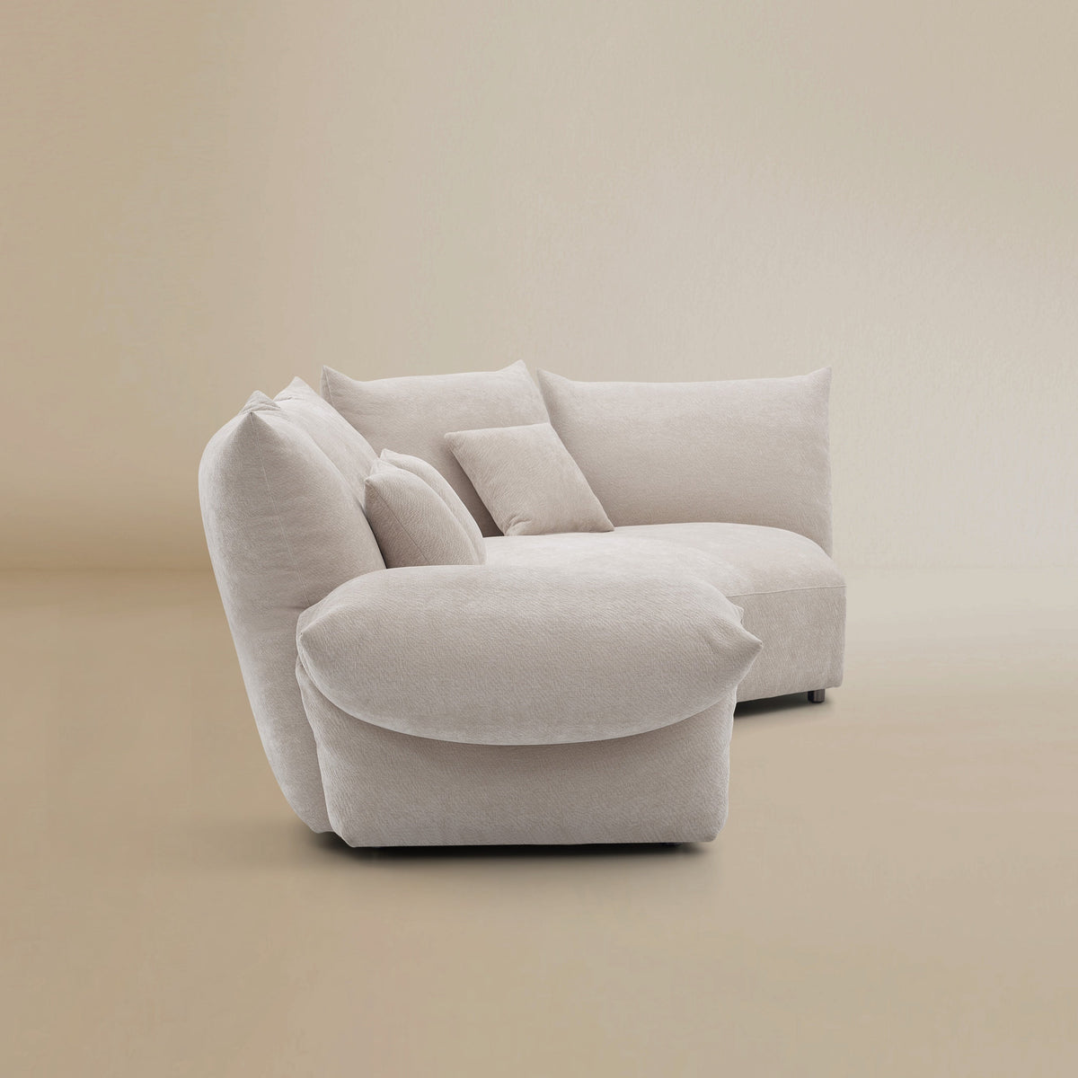 Side view of the Blooming Embrace Modular Sofa, Large Chaise with Two Seater, in Pearl White chenille on a beige studio background