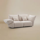 [Pearl White / Blooming Two Seater (86"-94")] Angled view of the Blooming Embrace Modular Sofa, Two Seater, in Pearl White chenille on a beige studio background