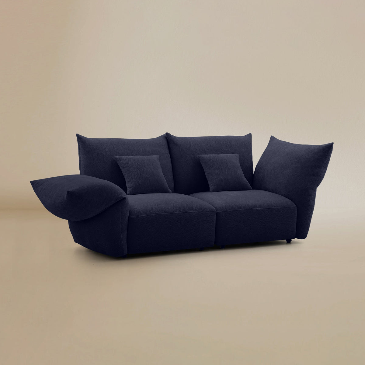Angled view of the Blooming Embrace Modular Sofa, Two Seater, in Serenity Blue chenille on a beige studio background