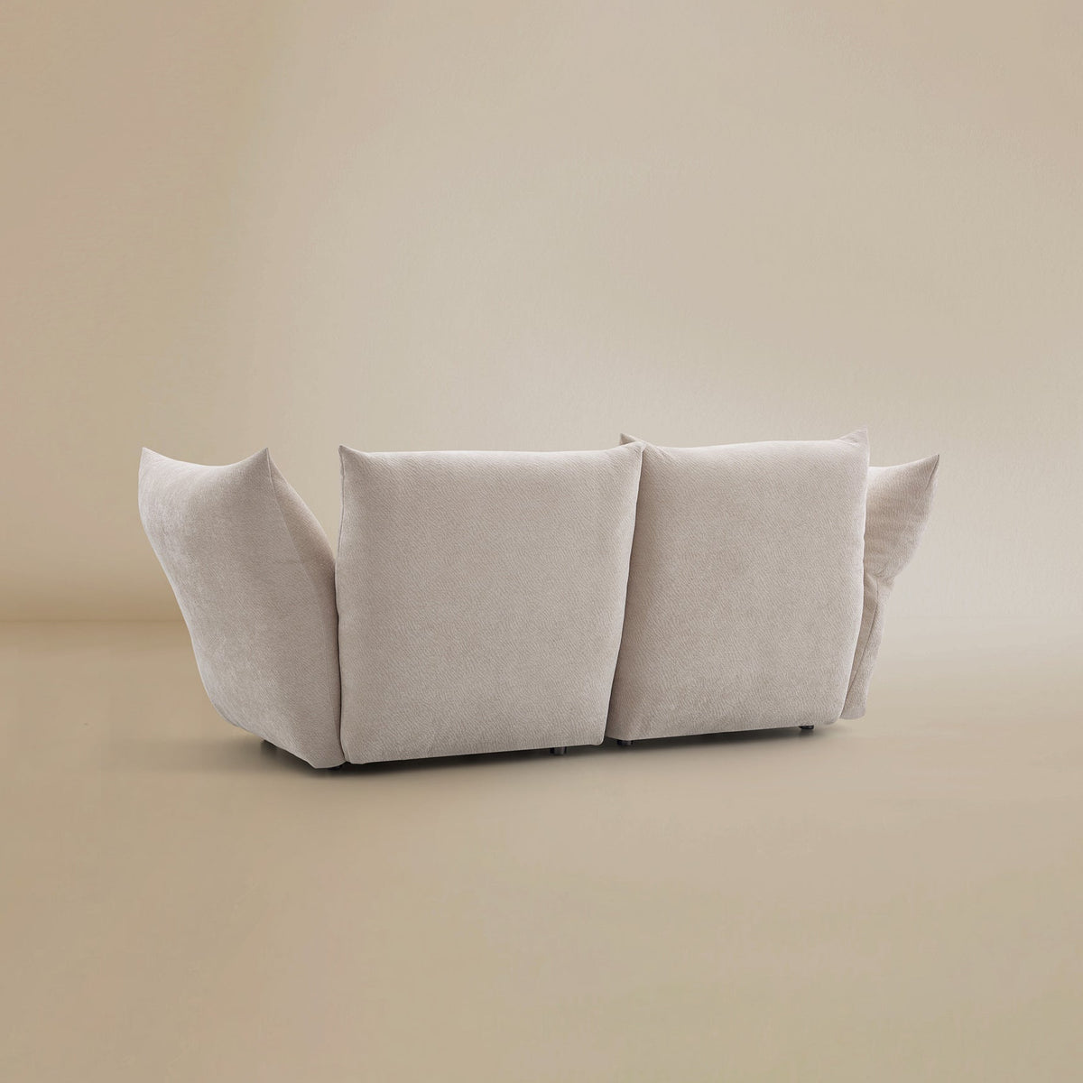 Back view of the Blooming Embrace Modular Sofa, Two Seater, in Pearl White chenille on a beige studio background