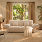 [Pearl White / Blooming Two Seater (86"-94")] Blooming Embrace Modular Sofa, Two Seater, in Pearl White chenille in a sunlit living room with an arched window and a fluted stone coffee table