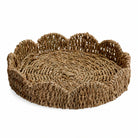 Cala natural handwoven seagrass tray with a raised scalloped rim on a white background.