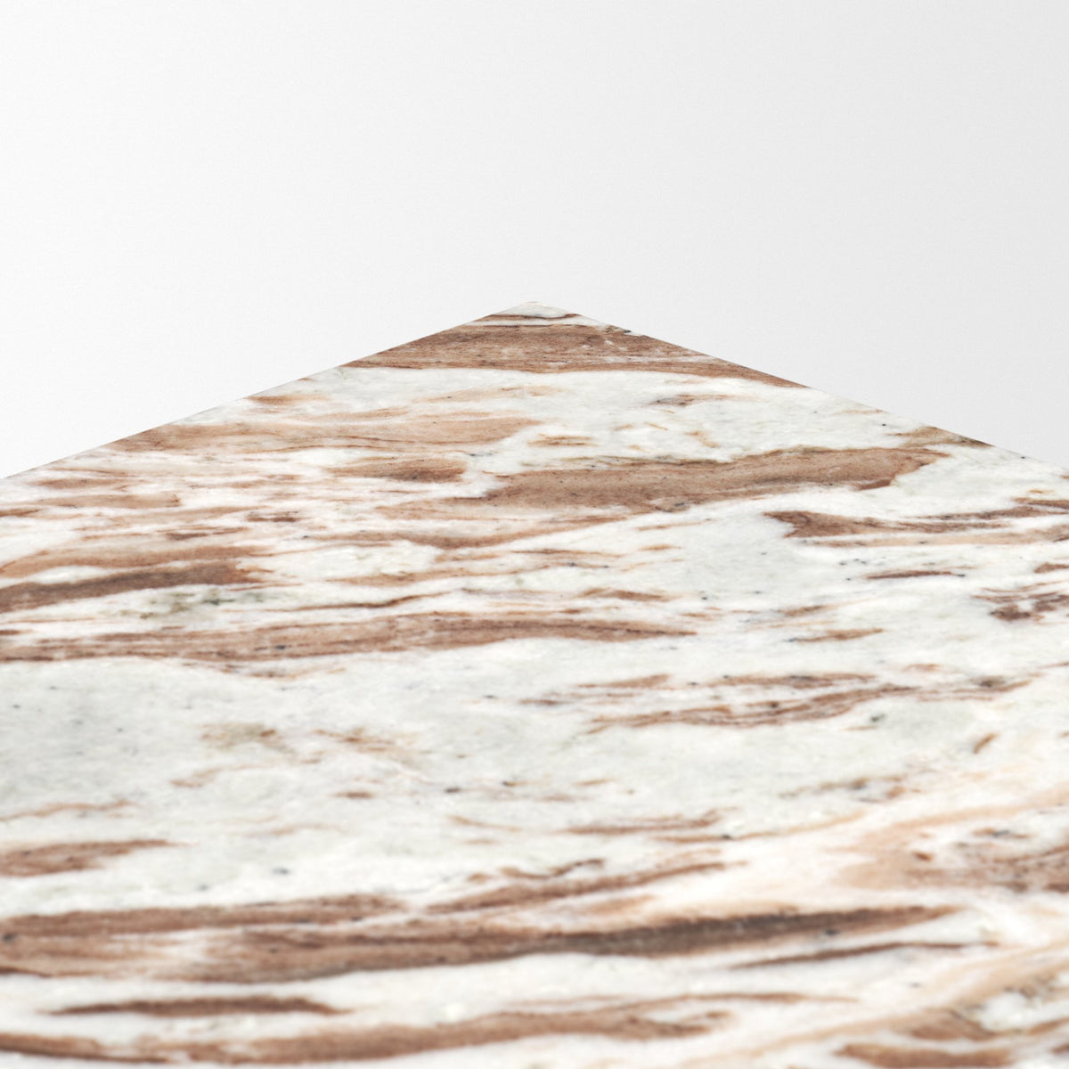 High-angle close-up of the polished marble top on the Calista Marble Plinth Side Table showing natural flowing veining.