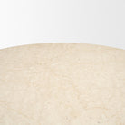 Close-up of the Caspia dining table polished Botticino marble surface